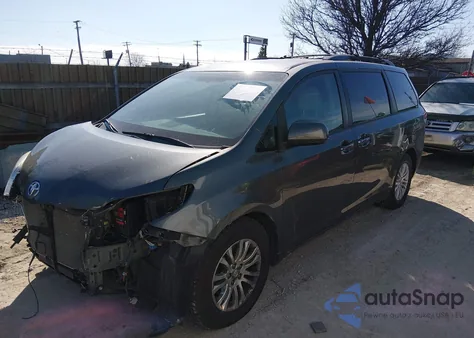 2014 Toyota Sienna Xle V6 8 Passenger z USA, uszkodzony, nr VIN 5TDYK3DC7ES471425